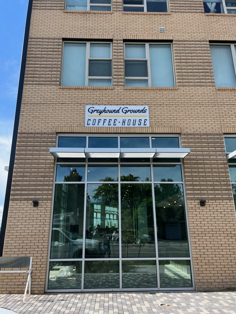 Greyhound Grounds Coffee House storefront sign