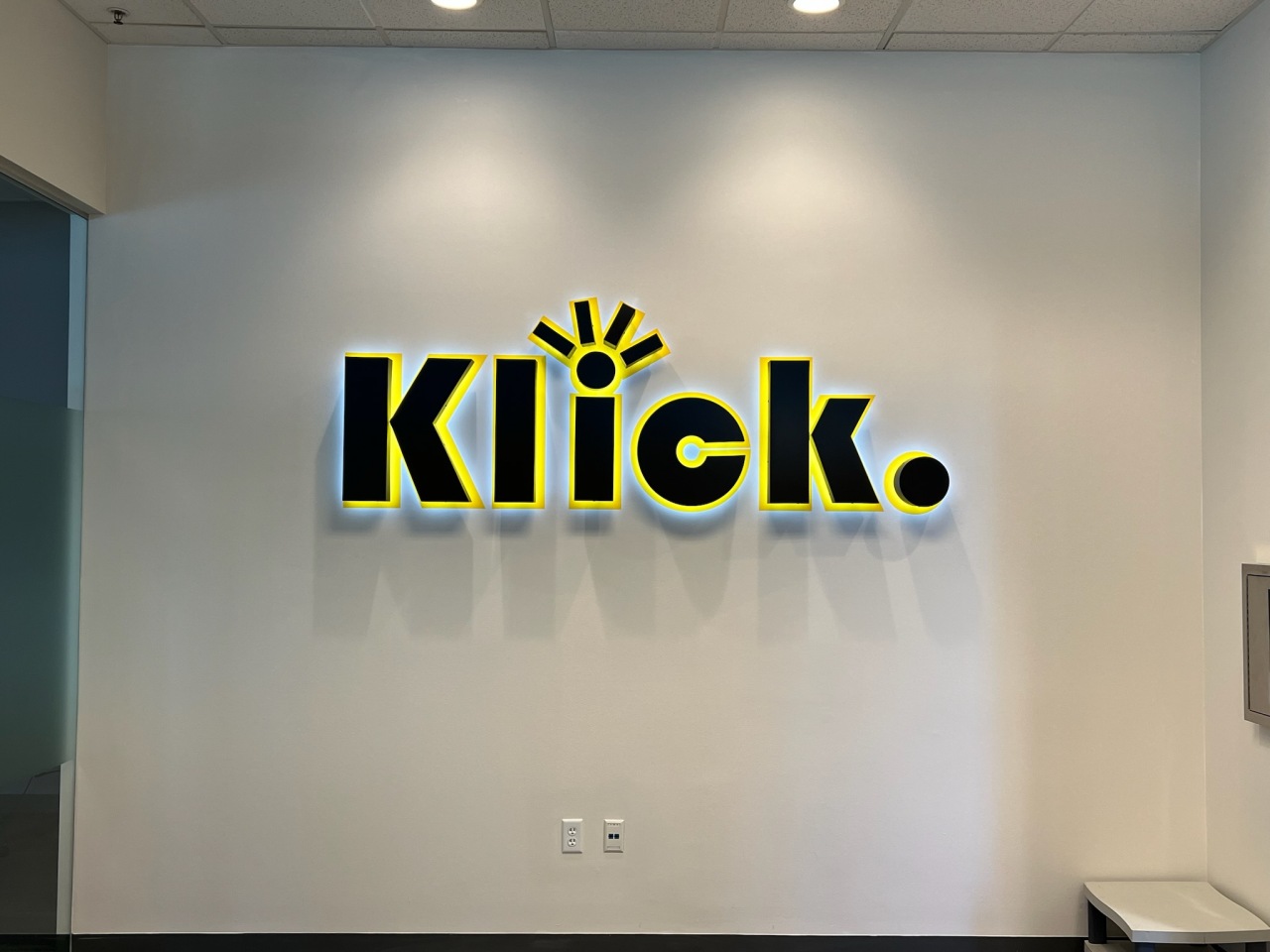 Klick. backlit halo channel-letter lobby sign